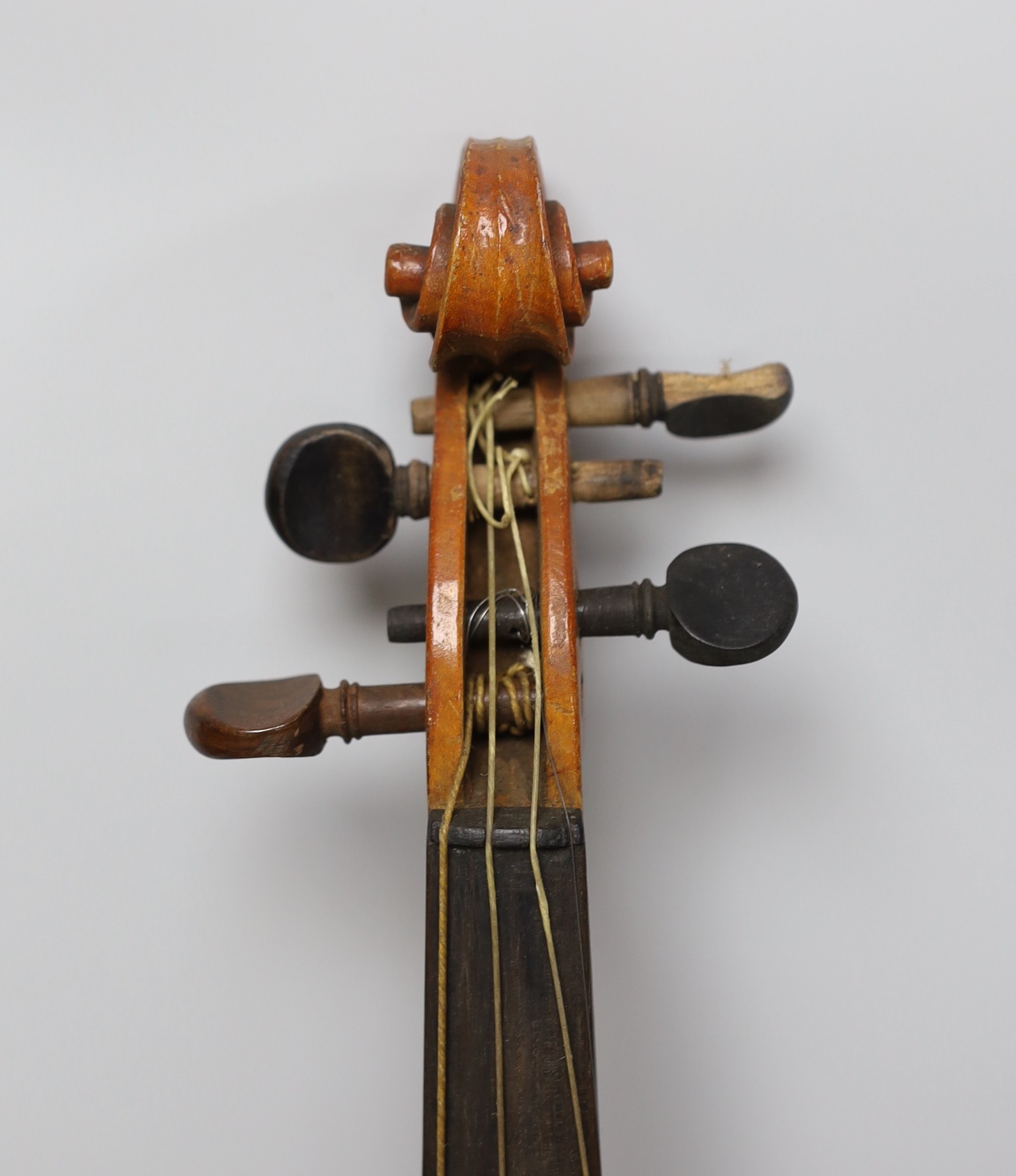 An early 20th century Stainer violin, patent number 23140, back measures 36.5cm excl button. cased